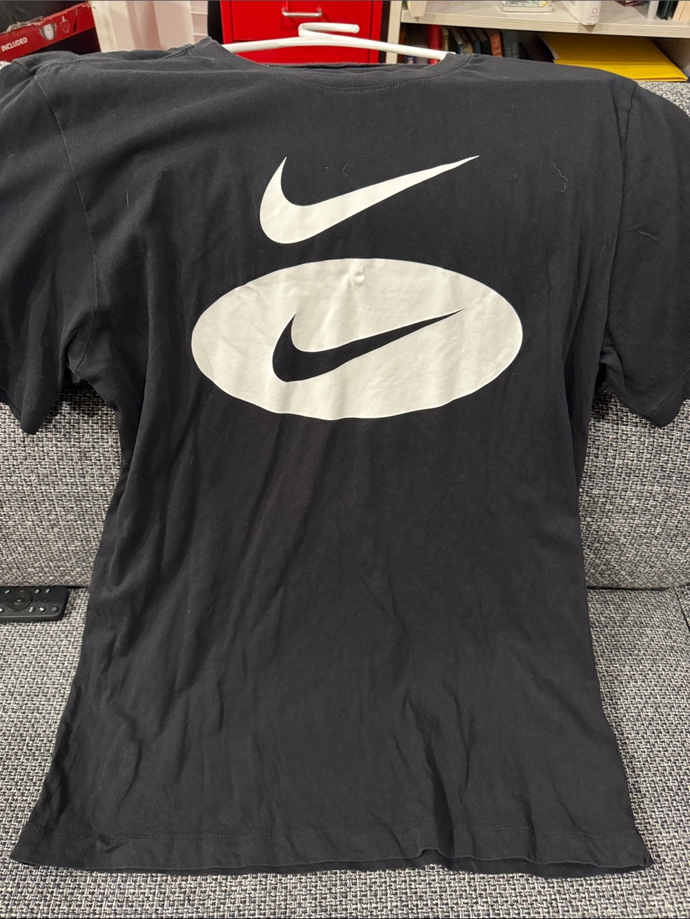Nike Black Short-Sleeve Tee with White Swoosh Graphics